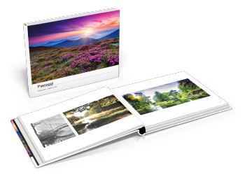 Photo books created with iPhoto and Foto.