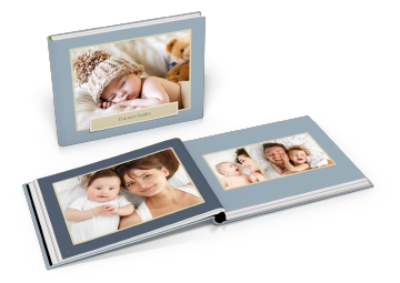 Photo books created with iPhoto and Foto.