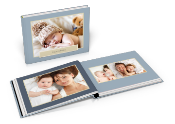 Photo books created with iPhoto and Foto.