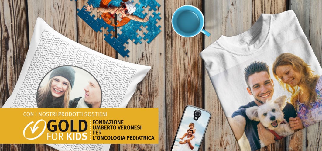 ilFotoalbum sostiente Gold for Kids di Fondazione Umberto Veronesi per l